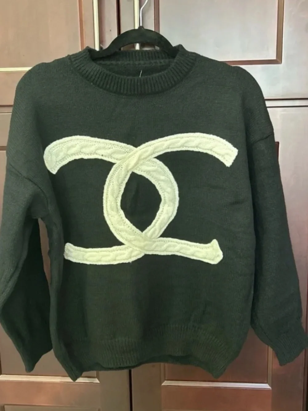 Soft black luxe CC sweater